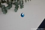 Угловая столешница из кварцевого агломерата под мрамор с мойкой фото