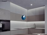 Г-образная столешница из искусственного камня с вырезом под варочную панель фото